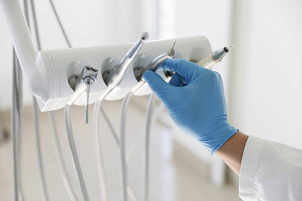 Professional Tooth Extraction technician working in Hendersonville, NC